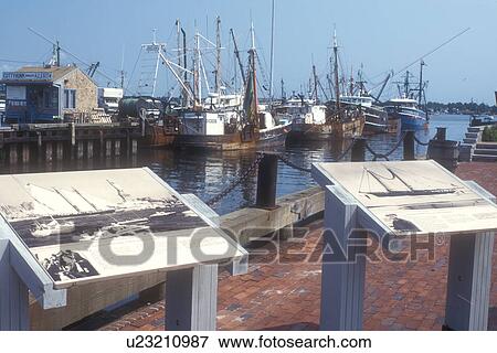 Stock Photo -  Massachusetts, Buzzards Bay, New Bedford, Fishing boats moored at Buzzard's Bay in New Bedford, Massachusetts.. Fotosearch