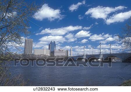 Stock Image -  Massachusetts, Connecticut River, Springfield, Memorial Bridge crosses the Connecticut River in Springfield, Massachusetts in the spring.. Fotosearch
