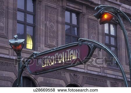 Metro, Paris, France, Europe, sign, Metropolitain, Elaborate metro sign above the underground metro station outside the Louvre in Paris. View Large Photo Image Stock Photo - Metro, Paris, France, Europe, sign, Metropolitain, Elaborate metro sign above the underground metro station outside the Louvre in Paris.. Fotosearch