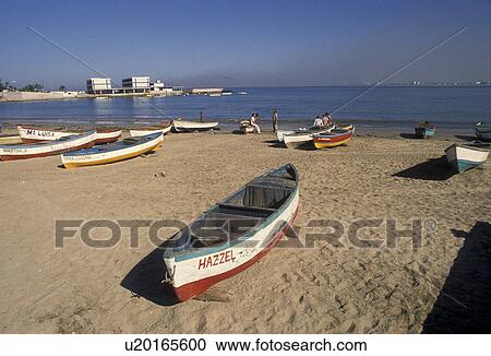 Stock Image -  Mexico, Mazatlan, beach, boats, Pacific Ocean, Fishing boats on the beach on the Pacific Ocean in Mazatlan Pearl of the Pacific in the state of Sinaloa.. Fotosearch