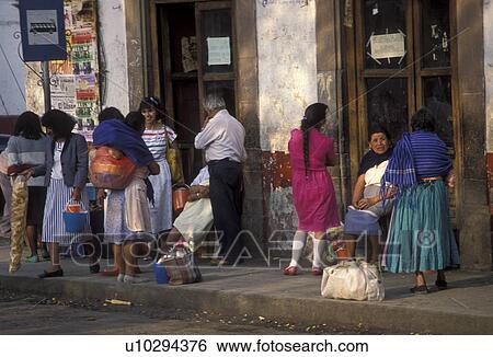 Mexico, people, Patzcuaro, Mexican people wearing colorful clothes waiting for the bus in the city of Patzcuaro in the state of Michoacan. View Large Photo Image Stock Photograph - Mexico, people, Patzcuaro, Mexican people wearing colorful clothes waiting for the bus in the city of Patzcuaro in the state of Michoacan.. Fotosearch