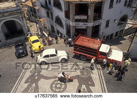 Mexico, Taxco, Aerial view of Main Street with mural in the town of Taxco Silver City in the state of Guerrero. Taxco is the oldest mining town in North America View Large Photo Image Stock Photography - Mexico, Taxco, Aerial view of Main Street with mural in the town of Taxco Silver City in the state of Guerrero. Taxco is the oldest mining town in North America . Fotosearch