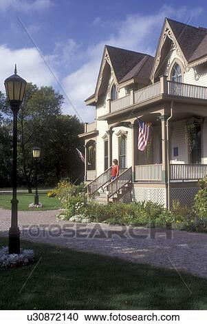 Stock Image -  Michigan, The Bradley Home, circa 1874, at the Herbert H. Dow Historical Museum in Midland (founder of Dow Chemical Co).. Fotosearch