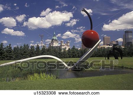 Minneapolis, spoon, cherry, Twin Cities, Minnesota, Spoonbridge and Cherry Sculpture in the Minneapolis Sculpture Garden at the Walker Art Center with a view of the skyline of downtown Minneapolis in the state of Minnesota. View Large Photo Image Stock Photo - Minneapolis, spoon, cherry, Twin Cities, Minnesota, Spoonbridge and Cherry Sculpture in the Minneapolis Sculpture Garden at the Walker Art Center with a view of the skyline of downtown Minneapolis in the state of Minnesota.. Fotosearch