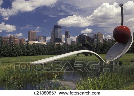 Minneapolis, spoon, cherry, Twin Cities, Minnesota, Spoonbridge and Cherry Sculpture in the Minneapolis Sculpture Garden at the Walker Art Center with a view of the skyline of downtown Minneapolis in the state of Minnesota. View Large Photo Image Stock Photo - Minneapolis, spoon, cherry, Twin Cities, Minnesota, Spoonbridge and Cherry Sculpture in the Minneapolis Sculpture Garden at the Walker Art Center with a view of the skyline of downtown Minneapolis in the state of Minnesota.. Fotosearch
