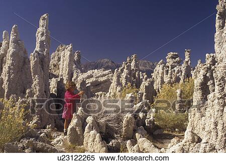 Mono Lake, Sierra Nevada Mountains, California, Mono Lake, Young girl (7 years old) stands among the tufa, spires and knobs formed of calcium carbonate at Mono Lake Tufa State Reserve in the state of California. View Large Photo Image Stock Photography - Mono Lake, Sierra Nevada Mountains, California, Mono Lake, Young girl (7 years old) stands among the tufa, spires and knobs formed of calcium carbonate at Mono Lake Tufa State Reserve in the state of California.. Fotosearch
