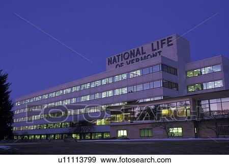 Stock Photo -  Montpelier, insurance company, Vermont, VT, National Life of Vermont building in Montpelier in the evening in winter.. Fotosearch