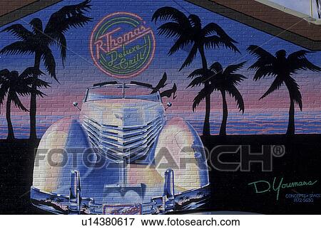 Stock Photo -  mural, Atlanta, Buckhead, Georgia, R. Thomas Mural on Peachtree Road in Atlanta. Mural of an antique car with palm trees.. Fotosearch