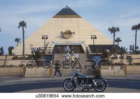 Myrtle Beach, Hard Rock Cafe, South Carolina, Harley Davidson motorcycle parked outside pyramid shaped Hard Rock Cafe in Myrtle Beach, South Carolina. View Large Photo Image Picture - Myrtle Beach, Hard Rock Cafe, South Carolina, Harley Davidson motorcycle parked outside pyramid shaped Hard Rock Cafe in Myrtle Beach, South Carolina.. Fotosearch