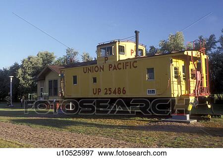 Nebraska, A yellow Union Pacific Caboose is an exhibit at Lincoln County Historical Museum & Village in North Platte. View Large Photo Image Stock Photo - Nebraska, A yellow Union Pacific Caboose is an exhibit at Lincoln County Historical Museum & Village in North Platte.. Fotosearch