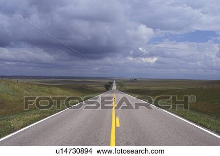 Nebraska, Highway 29 stretches for miles into the distant horizon in Sioux County. View Large Photo Image Picture - Nebraska, Highway 29 stretches for miles into the distant horizon in Sioux County. . Fotosearch