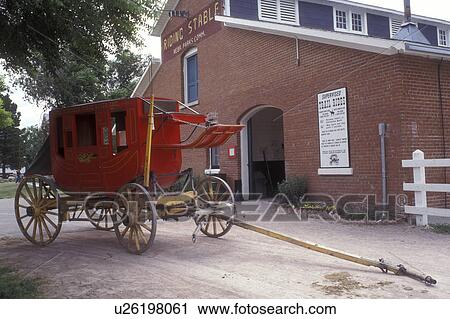 Nebraska, Red stagecoach parked in front of the stables at Fort Robinson State Park in Crawford. View Large Photo Image Stock Image -  Nebraska, Red stagecoach parked in front of the stables at Fort Robinson State Park in Crawford.. Fotosearch