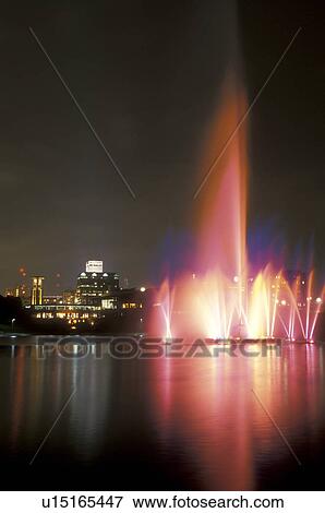 Nebraska, The colorful illuminated Heartland of America Fountain cascades into the water at the Heartland of America Park in Omaha at night. View Large Photo Image Stock Photo - Nebraska, The colorful illuminated Heartland of America Fountain cascades into the water at the Heartland of America Park in Omaha at night.. Fotosearch