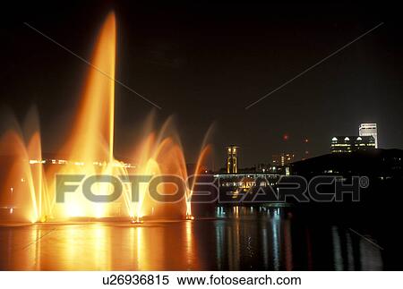 Nebraska, The colorful illuminated Heartland of America Fountain cascades into the water at the Heartland of America Park in Omaha at night. View Large Photo Image Stock Photography -  Nebraska, The colorful illuminated Heartland of America Fountain cascades into the water at the Heartland of America Park in Omaha at night.. Fotosearch
