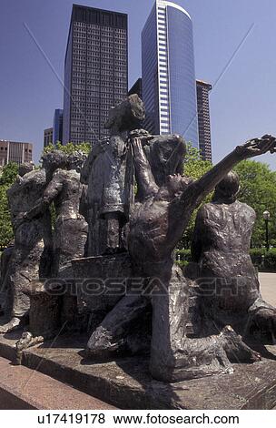 New York City, Battery Park, Manhattan, New York, NYC, N. Y. C The Immigrants Monument at Battery Park in Lower Manhattan in New York City in the state of New York. View Large Photo Image Stock Photo - New York City, Battery Park, Manhattan, New York, NYC, N. Y. C The Immigrants Monument at Battery Park in Lower Manhattan in New York City in the state of New York.. Fotosearch