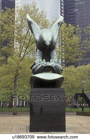 New York City, Battery Park, Manhattan, New York, NYC, N. Y. C East Coast War Memorial statue of eagle at Battery Park in Lower Manhattan in New York City in the state of New York. View Large Photo Image Stock Photo - New York City, Battery Park, Manhattan, New York, NYC, N. Y. C East Coast War Memorial statue of eagle at Battery Park in Lower Manhattan in New York City in the state of New York.. Fotosearch