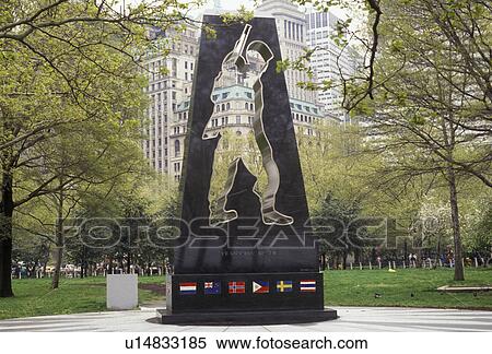 Stock Photography -  New York City, Battery Park, Manhattan, New York, NYC, N. Y. C Universal Soldier Memorial at Battery Park in Lower Manhattan in New York City in the state of New York.. Fotosearch