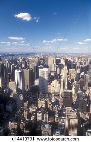 Stock Image -  New York City, Manhattan, New York, N. Y. C Aerial view of New York City, New York looking north toward Midtown Manhattan from the Empire State Building.. Fotosearch