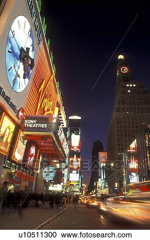New York City, Manhattan, New York, Time Square illuminated at night (evening) along Broadway in Mid town Manhattan. View Large Photo Image Stock Image - New York City, Manhattan, New York, Time Square illuminated at night (evening) along Broadway in Mid town Manhattan.. Fotosearch
