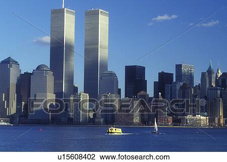 New York City, New York, Manhattan, The skyline of downtown Manhattan rises above the waters of the New York Harbor. The yellow water taxi carries passengers back to New Jersey View Large Photo Image Stock Image - New York City, New York, Manhattan, The skyline of downtown Manhattan rises above the waters of the New York Harbor. The yellow water taxi carries passengers back to New Jersey. Fotosearch