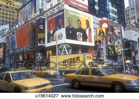 Stock Photo -  New York City, Times Square, Broadway, Manhattan, New York, N. Y. C Yellow taxis driving along Broadway on Times Square in Midtown Manhattan in New York City, New York.. Fotosearch