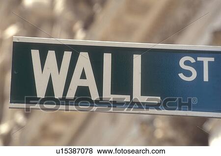 Stock Photo -  New York City, Wall Street, money, New York, Manhattan, N. Y. C nyc, Wall Street road sign in the financial district of New York City, New York. New York Stock Exchange. Fotosearch