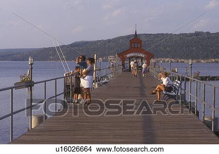New York, Finger Lakes, People enjoy the Watkin's Glen Public Pier on Seneca Lake in Watkins Glen.,  View Large Photo Image Picture -  New York, Finger Lakes, People enjoy the Watkin's Glen Public Pier on Seneca Lake in Watkins Glen., . Fotosearch