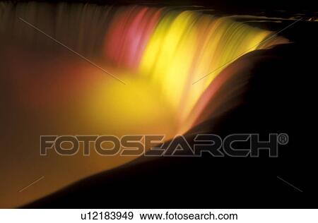 Niagara Falls, Ontario, Canada, Horseshoe Falls are illuminated at night (evening) in Niagara Falls. View Large Photo Image Stock Photo - Niagara Falls, Ontario, Canada, Horseshoe Falls are illuminated at night (evening) in Niagara Falls.. Fotosearch