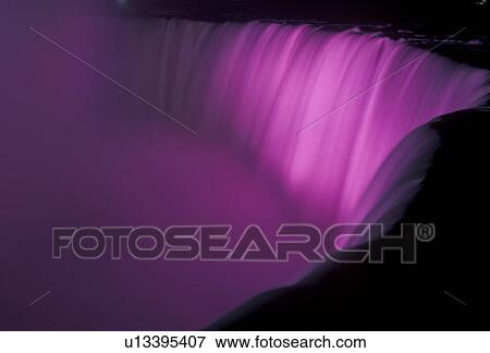 Niagara Falls, waterfall, New York, Scenic view of the American Falls illuminated in purple lights at night in Niagara Falls in the state of New York. View Large Photo Image Stock Photo - Niagara Falls, waterfall, New York, Scenic view of the American Falls illuminated in purple lights at night in Niagara Falls in the state of New York.. Fotosearch