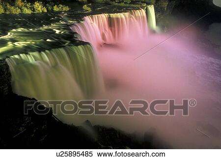 Niagara Falls, waterfall, New York, Scenic view of the American Falls illuminated at night in Niagara Falls in the state of New York. View Large Photo Image Stock Photography - Niagara Falls, waterfall, New York, Scenic view of the American Falls illuminated at night in Niagara Falls in the state of New York.. Fotosearch