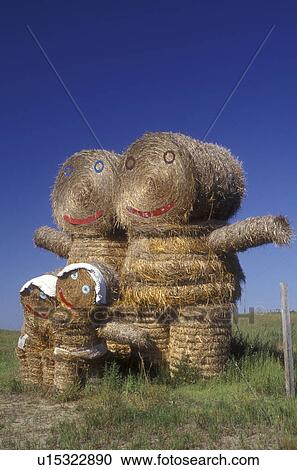 North Dakota, A hay bale display in shapes like people in a family in a hay field. View Large Photo Image Stock Image - North Dakota, A hay bale display in shapes like people in a family in a hay field.. Fotosearch