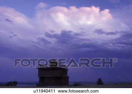 North Dakota, Infantry Post Blockhouse at Fort Abraham Lincoln State Park in Mandan. Storm clouds in the distant sky. View Large Photo Image Stock Image - North Dakota, Infantry Post Blockhouse at Fort Abraham Lincoln State Park in Mandan. Storm clouds in the distant sky.. Fotosearch