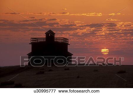 Stock Photo -  North Dakota, Infantry Post Blockhouse at [sunrise, sunset] at Fort Abraham Lincoln State Park in Mandan., . Fotosearch