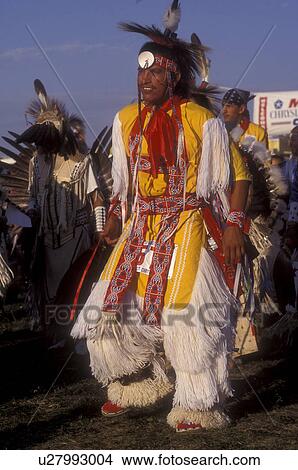 Picture -  North Dakota, Pow Wow, Native American man dancing at a tribal dance contest in native costume at Little Shell Pow Wow on Fort Berthold Indian Reservation in New Town . Fotosearch