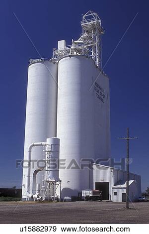 Stock Photo -  North Dakota, Tall white grain elevator in Williston.. Fotosearch