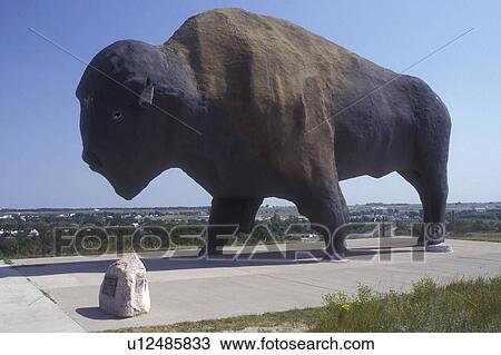 Stock Image -  North Dakota, The world's largest [bison, buffalo] can be seen at the Frontier Village in Jamestown . Fotosearch
