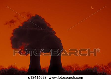 Stock Photo -  nuclear power plant, Limerick, Pennsylvania, Silhouette of steam rising from the cooling towers at Philadelphia Electric Company Nuclear Power Generating Station in Limerick in the state of Pennsylvania.. Fotosearch