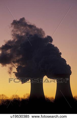Stock Photography -  nuclear power plant, Limerick, Pennsylvania, Silhouette of steam rising from the cooling towers at Philadelphia Electric Company Nuclear Power Generating Station at sunrise in Limerick in the state of Pennsylvania.. Fotosearch