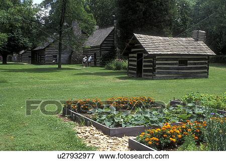 Stock Photo -  Ohio, New Philadelphia, Log cabins and gardens at the Schoenbrun Village State Memorial . Fotosearch