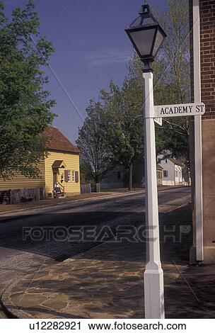Old Salem, Moravian, Winston-Salem, North Carolina, A lamp post on the corner of a street in Old Salem, a living history restoration of the Moravian church town of Salem founded in 1766, in Winston-Salem in the state of North Carolina. View Large Photo Image Stock Image - Old Salem, Moravian, Winston-Salem, North Carolina, A lamp post on the corner of a street in Old Salem, a living history restoration of the Moravian church town of Salem founded in 1766, in Winston-Salem in the state of North Carolina.. Fotosearch