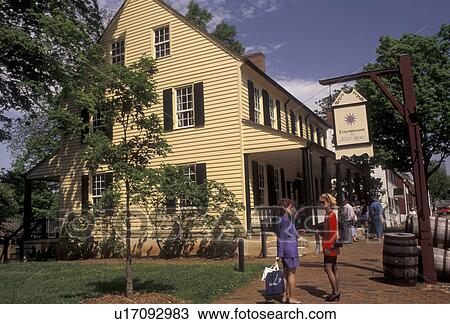 Old Salem, Moravian, Winston-Salem, North Carolina, Tourists stand outside the Salem Tavern in Old Salem, a living history restoration of the Moravian church town of Salem founded in 1766, in Winston-Salem in the state of North Carolina. View Large Photo Image Stock Image - Old Salem, Moravian, Winston-Salem, North Carolina, Tourists stand outside the Salem Tavern in Old Salem, a living history restoration of the Moravian church town of Salem founded in 1766, in Winston-Salem in the state of North Carolina.. Fotosearch