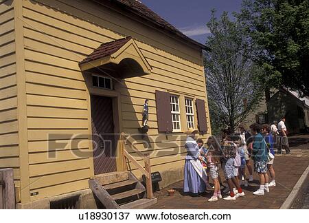 Old Salem, Moravian, Winston-Salem, North Carolina, A group of people listening to an interpreter outside the Miksch House in Old Salem, a living history restoration of the Moravian church town of Salem founded in 1766, in Winston-Salem in the state of N View Large Photo Image Stock Photo - Old Salem, Moravian, Winston-Salem, North Carolina, A group of people listening to an interpreter outside the Miksch House in Old Salem, a living history restoration of the Moravian church town of Salem founded in 1766, in Winston-Salem in the state of N. Fotosearch