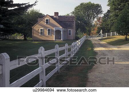 Old Strubridge Village, Massachusetts, A white fence along a dirt path leading to a restored home in Old Sturbridge Village, a living-history museum, in Sturbridge in the state of Massachusetts. View Large Photo Image Picture - Old Strubridge Village, Massachusetts, A white fence along a dirt path leading to a restored home in Old Sturbridge Village, a living-history museum, in Sturbridge in the state of Massachusetts. . Fotosearch