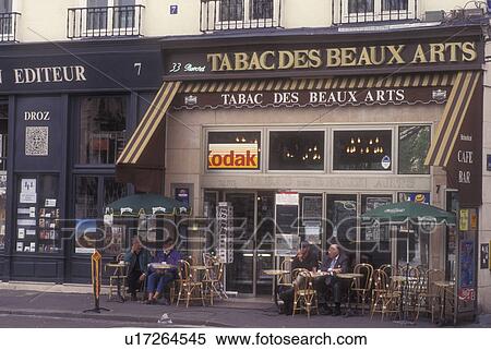 Stock Photography -  outdoor cafe, Paris, France, Europe, People sitting at an outdoor cafe at Tabac des Beaux Arts in Paris.. Fotosearch