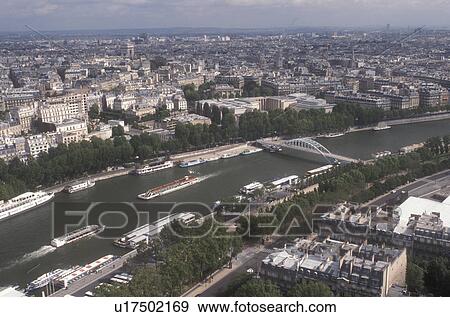 Paris, Seine River, France, The City of Light, Europe, Aerial view of Paris along the Seine River from the Eiffel Tower in Paris, France. View Large Photo Image Stock Photo - Paris, Seine River, France, The City of Light, Europe, Aerial view of Paris along the Seine River from the Eiffel Tower in Paris, France.. Fotosearch