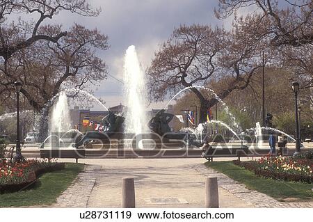 Philadelphia, fountain, Pennsylvania, Fountain at Logan Circle in early spring in downtown Philadelphia, Pennsylvania. The fountain was cast by Alexander Stirling Calder. View Large Photo Image Stock Photo - Philadelphia, fountain, Pennsylvania, Fountain at Logan Circle in early spring in downtown Philadelphia, Pennsylvania. The fountain was cast by Alexander Stirling Calder.. Fotosearch