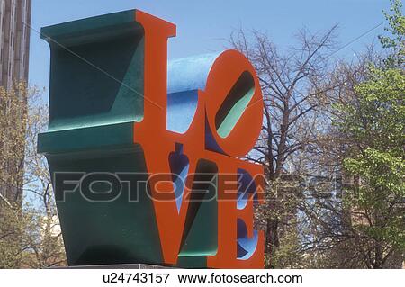 Stock Photo -  Philadelphia, love, Pennsylvania, The red LOVE Statue at Kennedy Plaza in downtown Philadelphia, Pennsylvania.. Fotosearch