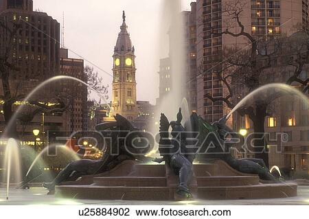 Philadelphia, Pennsylvania, Fountain at Logan Circle with City Hall in the background in the evening in downtown Philadelphia, Pennsylvania. The fountain was cast by Alexander Stirling Calder. View Large Photo Image Stock Image - Philadelphia, Pennsylvania, Fountain at Logan Circle with City Hall in the background in the evening in downtown Philadelphia, Pennsylvania. The fountain was cast by Alexander Stirling Calder.. Fotosearch
