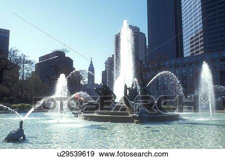Philadelphia, Pennsylvania, Fountain at Logan Circle and skyline of downtown Philadelphia, Pennsylvania. The fountain was cast by Alexander Stirling Calder. View Large Photo Image Stock Photo - Philadelphia, Pennsylvania, Fountain at Logan Circle and skyline of downtown Philadelphia, Pennsylvania. The fountain was cast by Alexander Stirling Calder.. Fotosearch