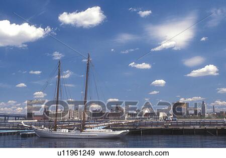 Stock Photo -  Philadelphia, Pennsylvania, Penn's Landing, Scenic view of Historic Penn's Landing on the Delaware River and Gazela of Philadelphia ship in Philadelphia, Pennsylvania.. Fotosearch
